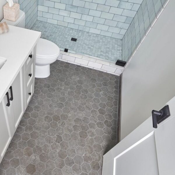 A bathroom with a toilet and sink in it