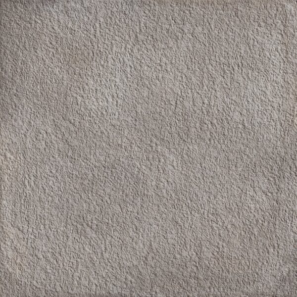 A gray tile floor with some white spots on it