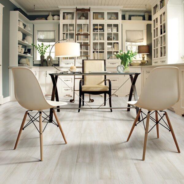 A room with two chairs and a table