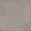 A gray tile background with some white spots