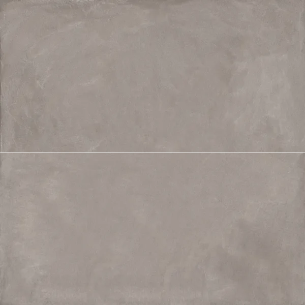 A gray tile background with some white spots