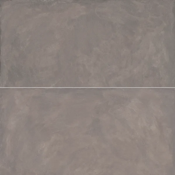 A gray tile background with some white spots