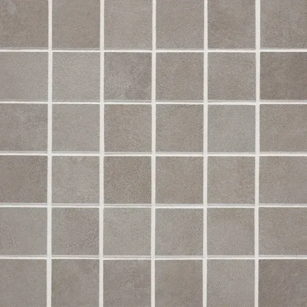 A close up of the tile surface of a bathroom floor