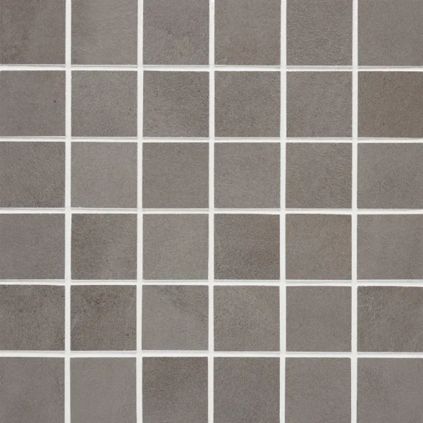 A close up of the tile surface of a bathroom floor