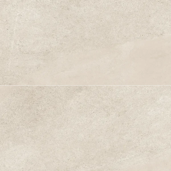 A white tile floor with some small bubbles