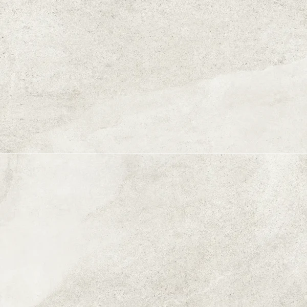 A white marble floor with some light colored stones