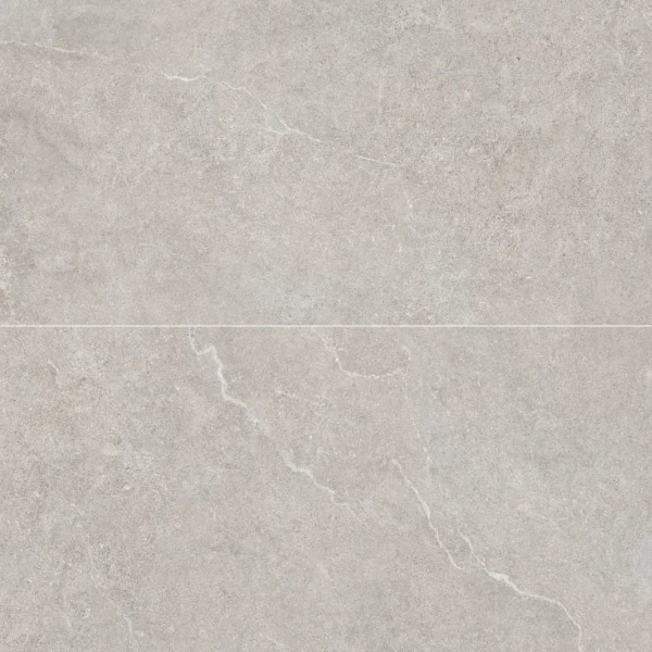 A white marble surface with some small bubbles