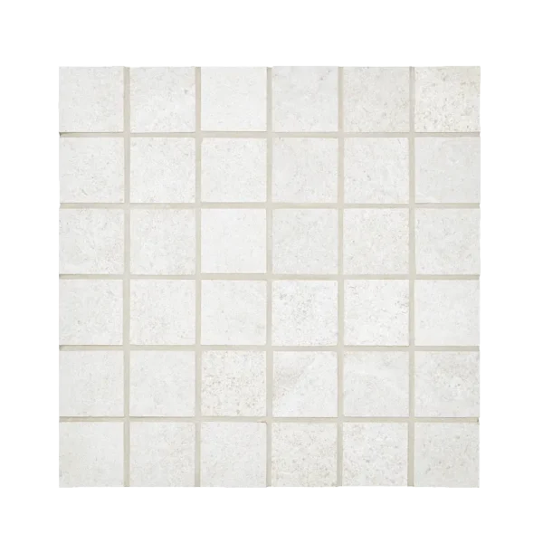 A white tile floor with no grout.