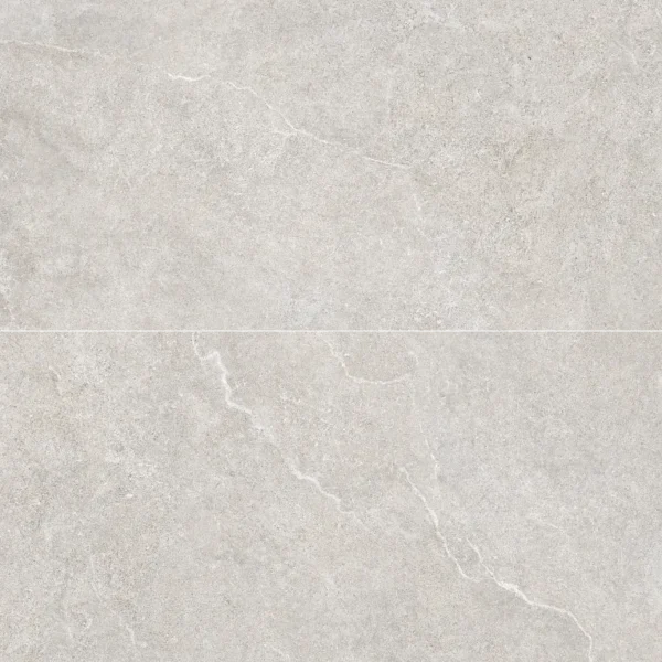 A white marble surface with some small bubbles