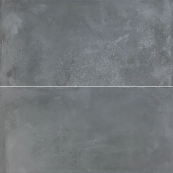 A gray tile floor with some type of pattern