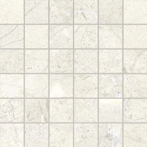 A white tile floor with some small squares