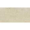 A white tile with some small bubbles on it