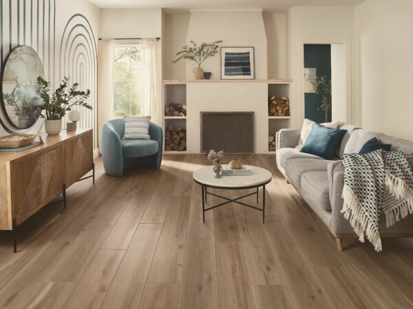 A living room with a fireplace and hardwood floors.