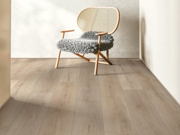 A chair and some wood floors in a room.