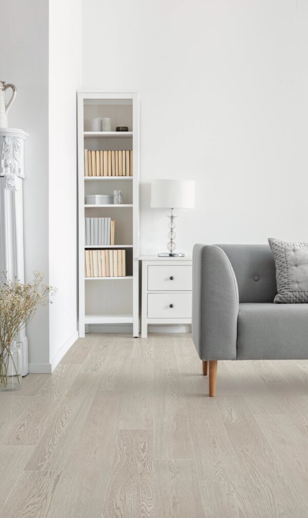 A living room with white walls and furniture.