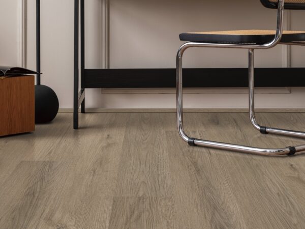 A chair and some floor in a room.
