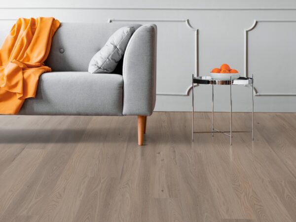 A living room with a couch and table