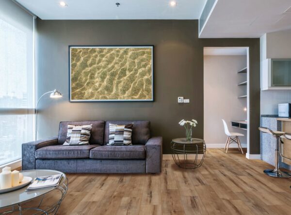 A living room with a couch and table