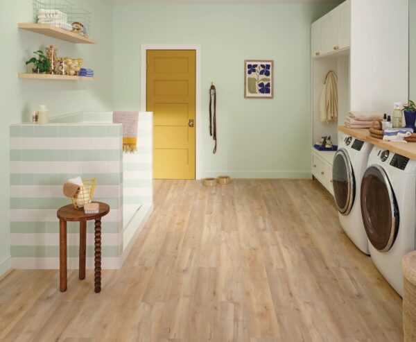 A room with wooden floors and white walls.