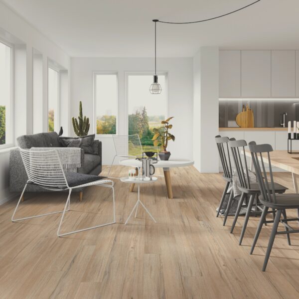 A living room with wooden floors and white walls.