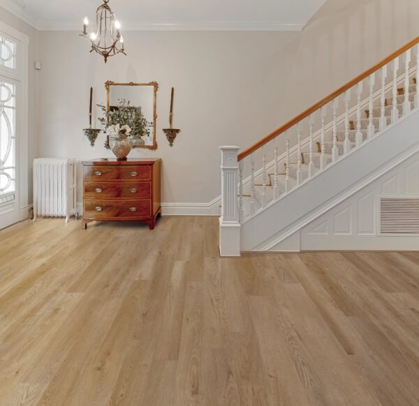 A room with wooden floors and white walls.