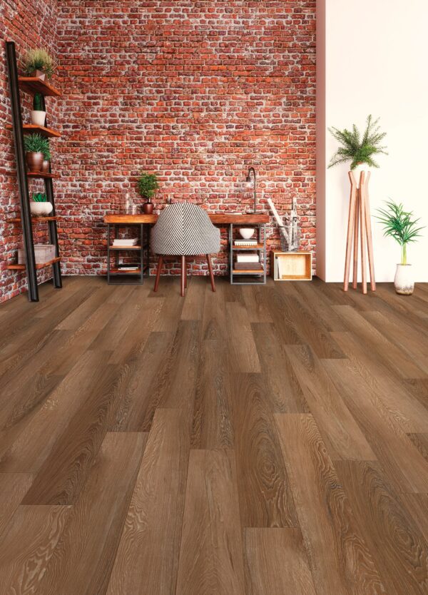 A room with a brick wall and wooden floors
