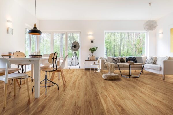 A living room with wooden floors and furniture.
