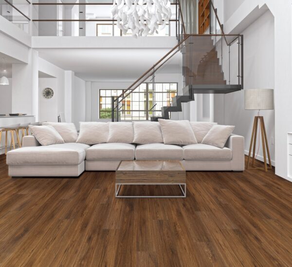 A living room with white furniture and wooden floors.