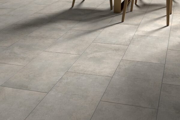 A close up of the floor tiles in a room