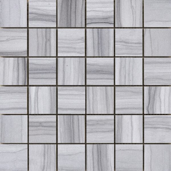 A close up of the tiles on the wall