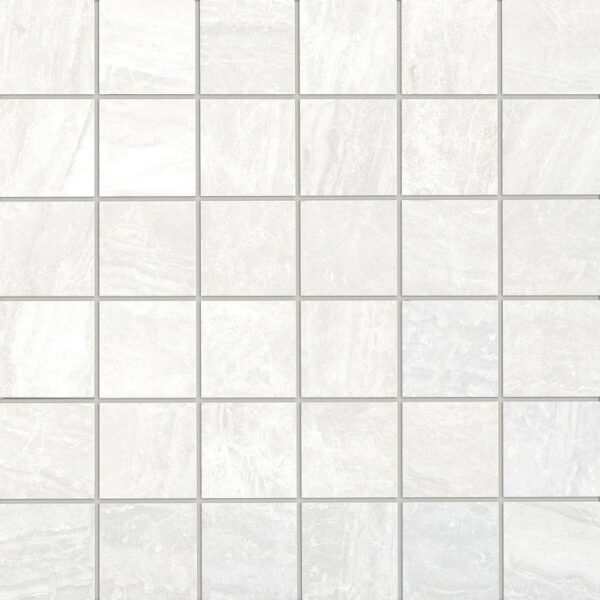 A white tile floor with some small squares